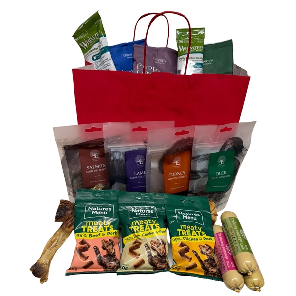 Julepose med naturlige tyggeting og godbidder til hunde